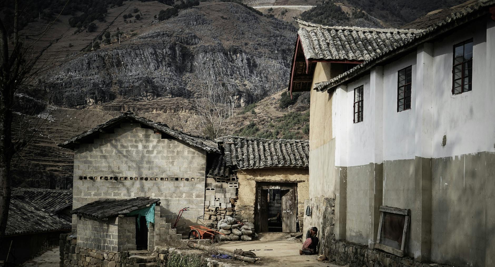 village near mountain cliff