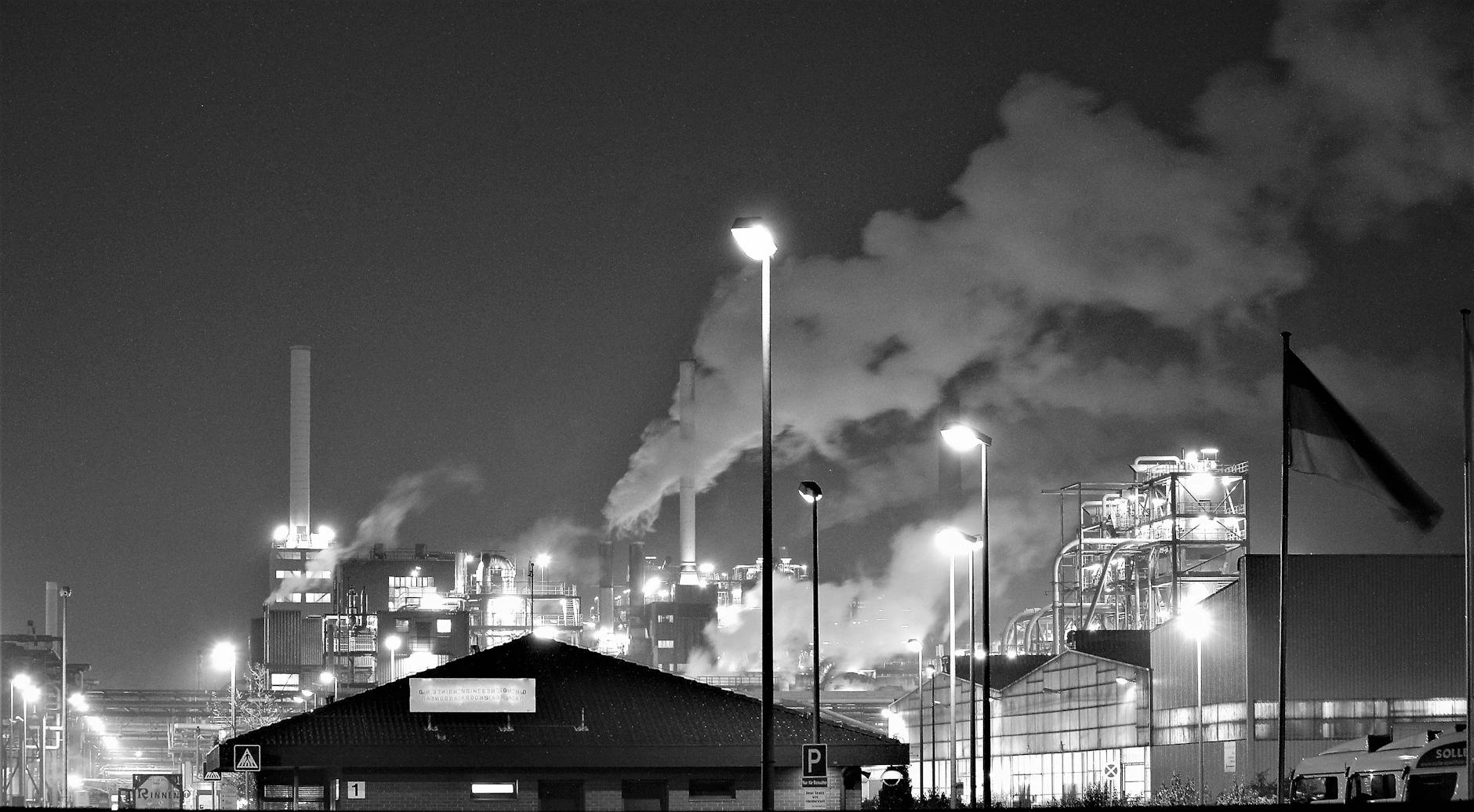 grayscale photography of a factory