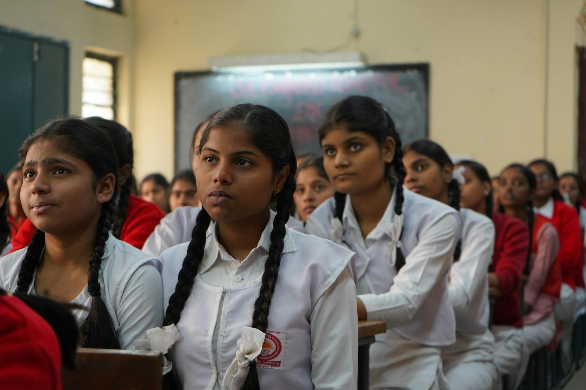 photograph of girls in a classroom